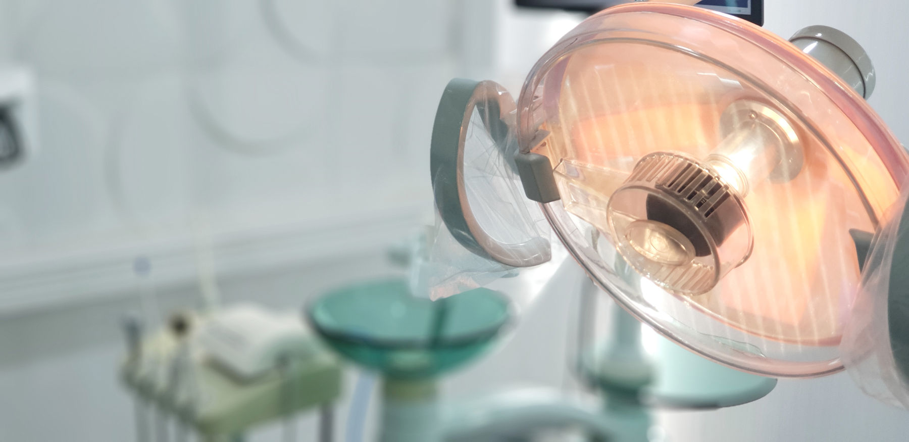 Dental operating light above a treatment chair